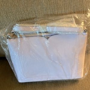 Generic light lavender purse never used.